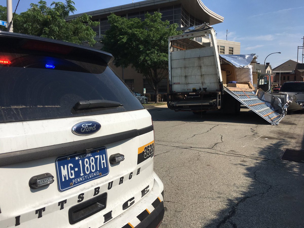 Box truck's roof ripped off after striking overpass