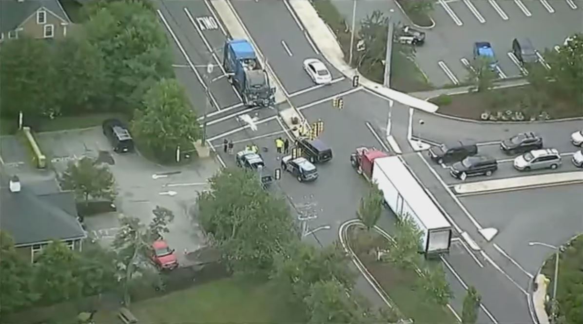 Police investigating crash between dump truck and motorcycle in Beverly