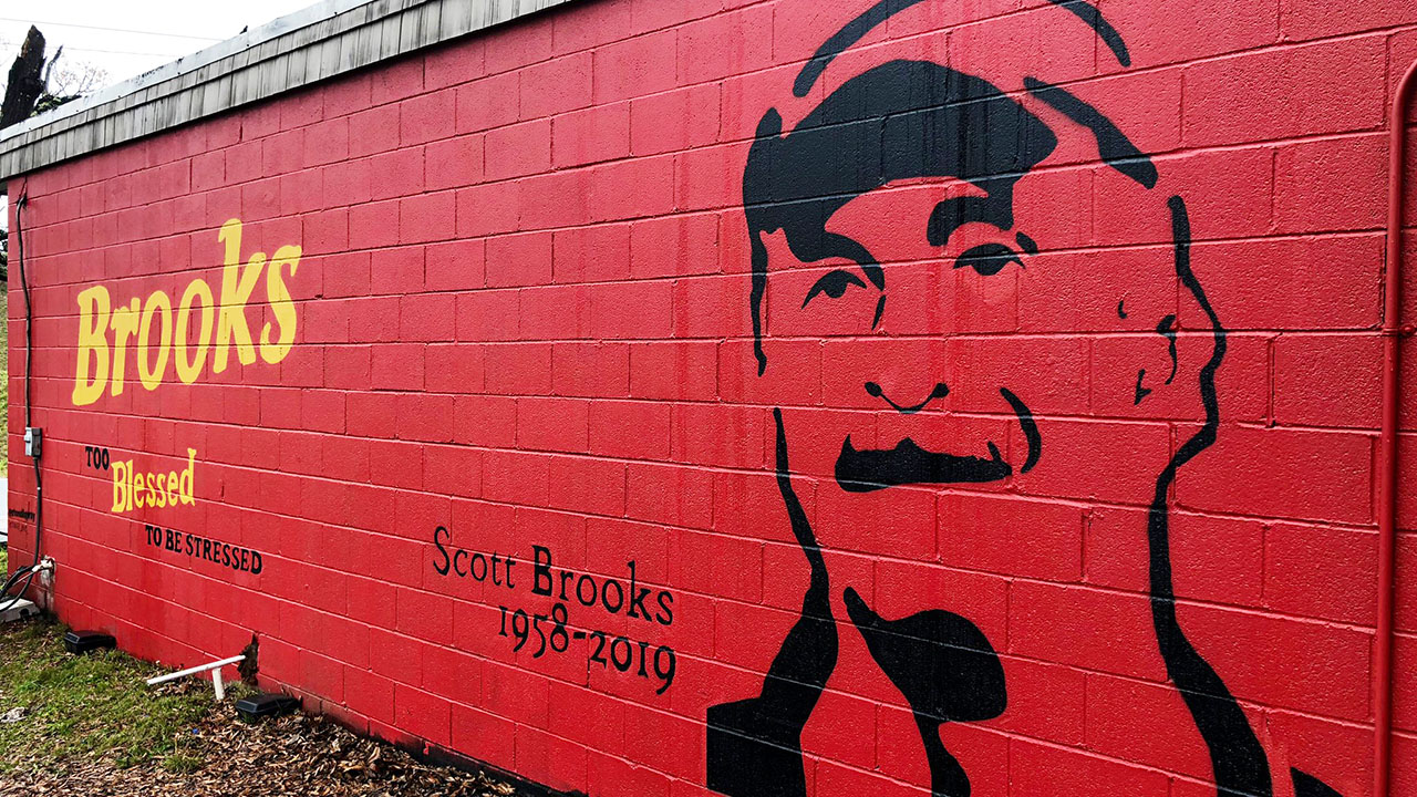 Artist’s mural on wall of popular Charlotte sandwich shop honors slain